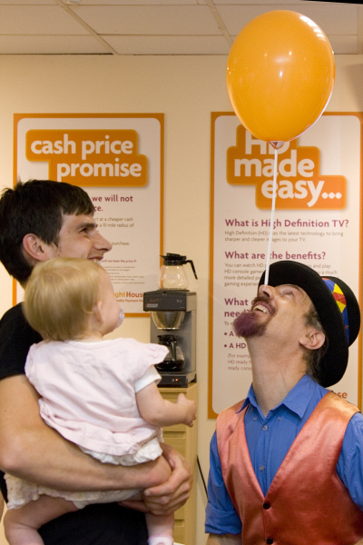 Kris Katchit entertains by balancing a balloon on his nose