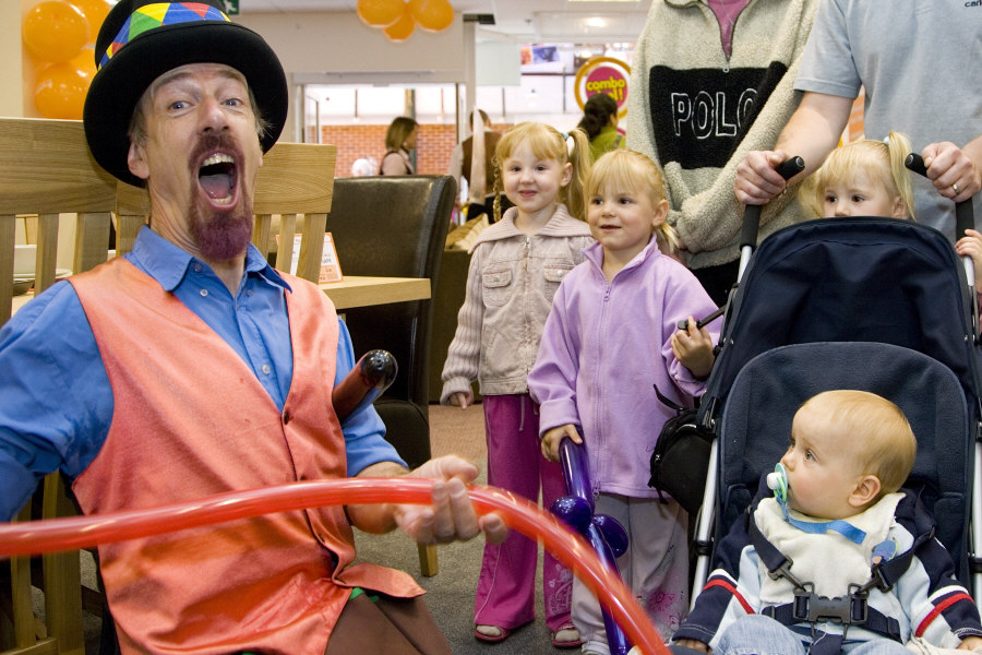 Kris Katchit entertains while making balloon models