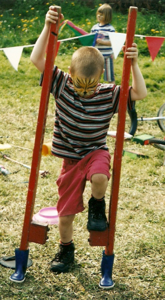 Learning to walk on stilts at a Kris Katchit circus workshop